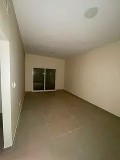 For rent in Muwaileh: 2BR apartment, 2 baths, balcony, prime location near schools &amp; malls, dire