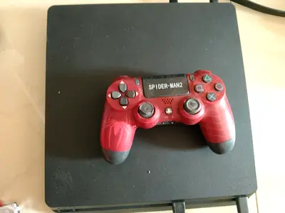 Sony PlayStation 4 with Spider-Man Controller with 500 gb full games