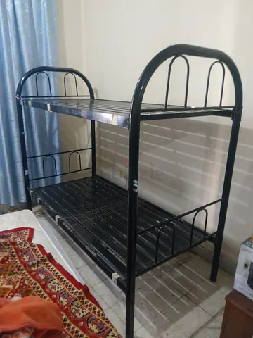 Single bed up and down bed new  condition. With mattress 2 nos