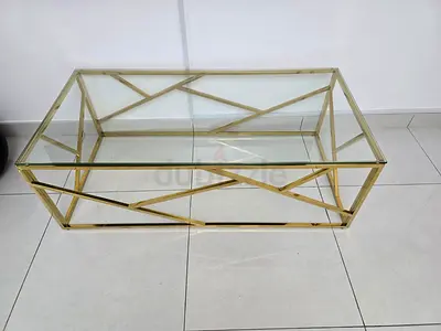 A coffee table for 250 AED and a trolley for 200 AED.