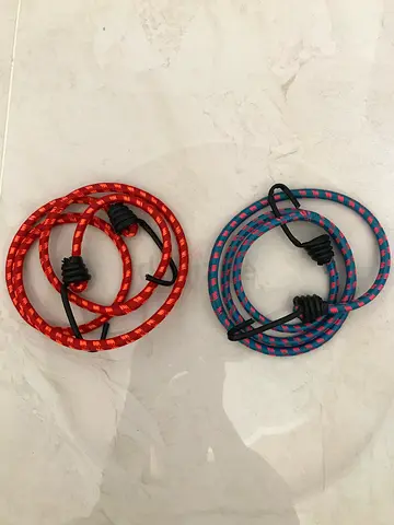Luggage bungee cords (also known as bungee ties, ropes, or spiders) are designed to secure cargo.
