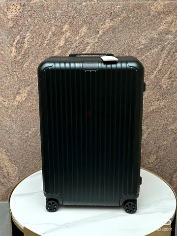Rimowa stylish black cabin size troly
