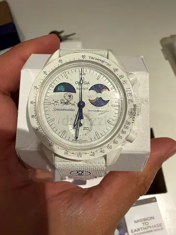 Omega Swatch Mission to Moonphase Gold, White Dial Watch