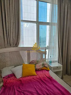 A great opportunity in Orient Towers: a one-bedroom apartment with a living room, parking, and a clo