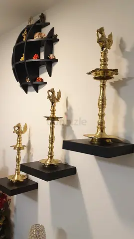 Elegant set of three traditional peacock-design lamps crafted from solid brass with a rich gold poli