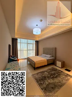 Furnished room and living room for monthly rent in Al-Ghalfa Towers