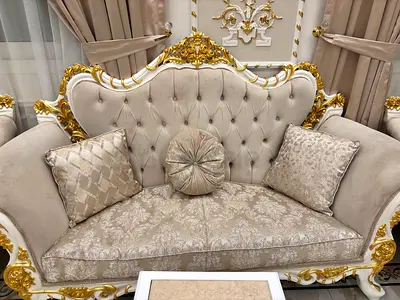 Elegant Vintage Sofa with Golden Accents