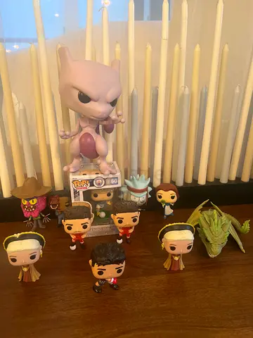 Funko Pop Collection Featuring Rick from Rick and Morty, firmino, erling haaland, mew two and more