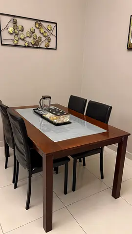 Sturdy Dining Table with Black Leather Chairs