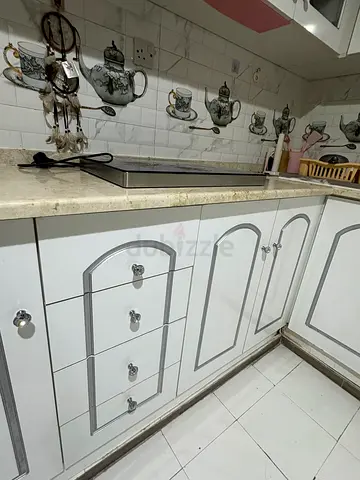 Stylish White Kitchen Cabinets with Elegant Handles