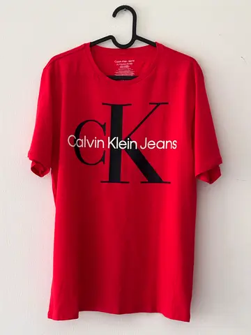 Original Stylish Calvin Klein Red T-Shirt - Perfect for Every Occasion (NEVER USED)