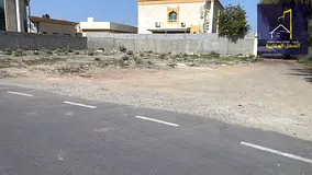 Land for sale in Al-Qouz area, Wasit suburb, with a permit for a residential villa.