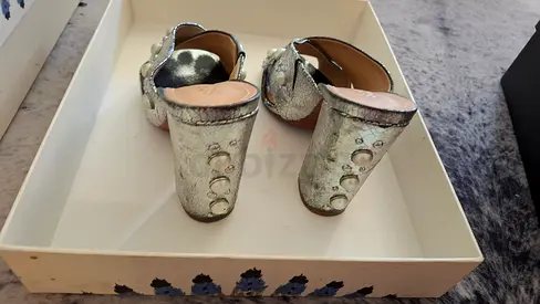 Stylish Silver Heels with Unique Detailing