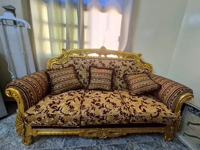 Elegant Gold and Brown Sofa with Cushions