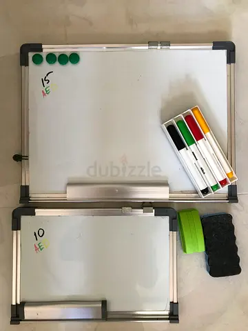 2 magnetic whiteboards and a set of drawing accessories, including erasers. Items pictured Whiteboar