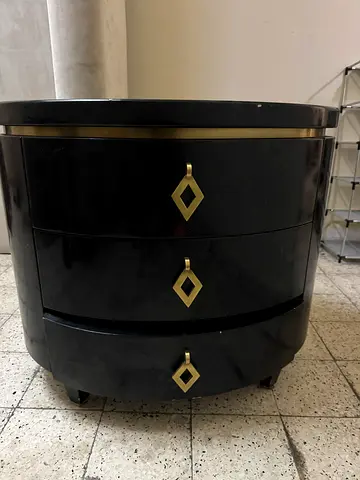 Elegant Black Nightstand with Gold Accents