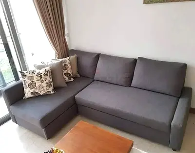 Ikea L Shape Sofa cum bed with big storage in L