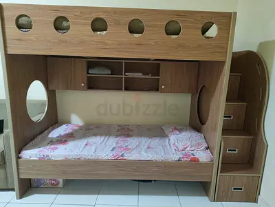 Affordable. Stylish Wooden Bunk Bed. With a shelf and stears with storage.a very good bed.Negotiable