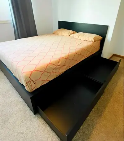 Ikea king size bed with mattress underneath 2 storage drawers available in perfect condition