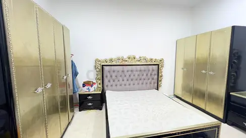 Elegant Gold Bedroom Set with Wardrobes and Bed