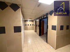 Building for sale in Muwailih commercial area, excellent location.