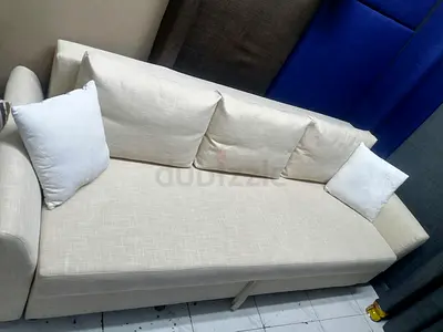 Comfortable Cream Sofa with Cushions