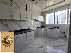 A strong offer for rent in Al Mowaihat 3 - Ajman, two rooms and a master hall with a balcony Central