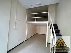 Commercial Shop with Mezzanine for Rent in Al Rashidiya – Prime Location and Excellent Investment 