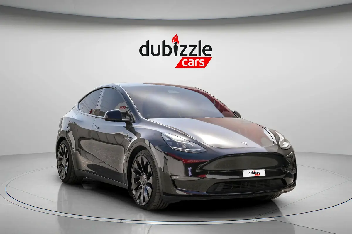 Tesla Model Y 2023 — photo 1 of 16
