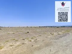 Residential plot for sale in Ajman - Al Manama 9, On the asphalt road.