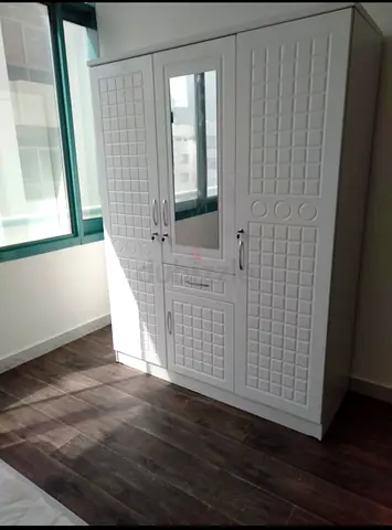 Stylish White Wardrobe with Mirror