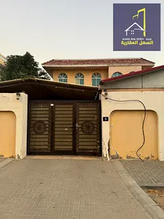 villa located in Al Nakhilat area, Emirate of Sharjah, situated in a quiet neighborhood suitable for
