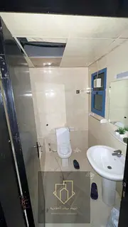 Luxury three-bedroom apartment for sale in Al Nuaimiya Towers, Ajman, with an area of ​​2,390 sq