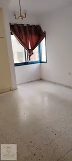 Two bedrooms and a living room in Al Majaz 3 with a balcony and open view,