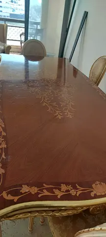 Elegant Wooden Dining Table with Intricate Design