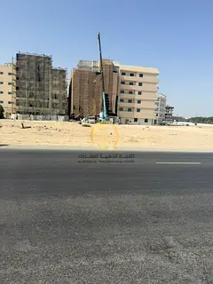 For sale: land in Al-Falah Camp, commercial, Muwailih, with land and building permit, ground floor p