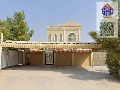 Villa for sale in Al Rawda area, fully furnished, five bedrooms (master suites), living room, majlis
