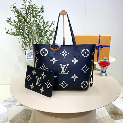 Louis Vuitton Neverfull MM Tote Bag In Monogram Empreinte Embossed Cowhide Leather