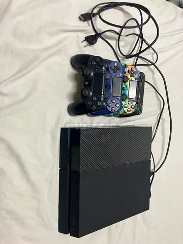 PS4 with 4 controllers for 620AED\\