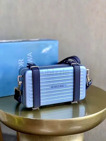 Dior Rimowa personal clutch bag