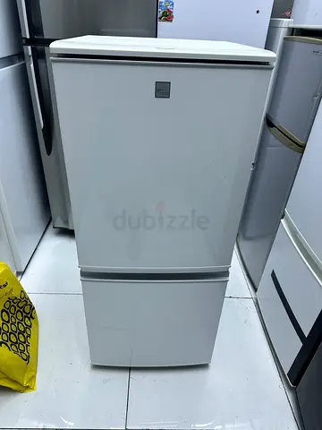 Sharp small refrigerator made Japan arrange one year warranty also delivery