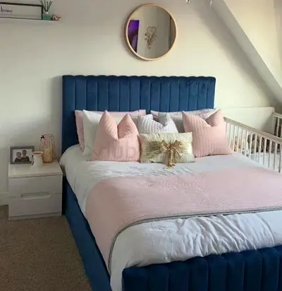 Elegant Blue Velvet Bed with Cushions
