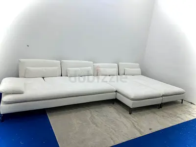 Selling rochebobois white color lshape sofa