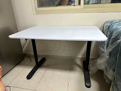 Ikea height adjustable table.
