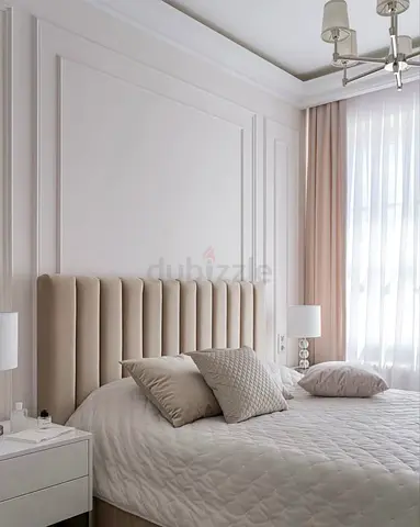 Elegant Modern Bedroom Setup with Chic Headboard
