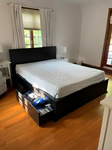 IKEA Malm king size bed frame with mattress.