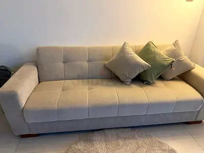 Comfortable Beige Sofa with Cushions