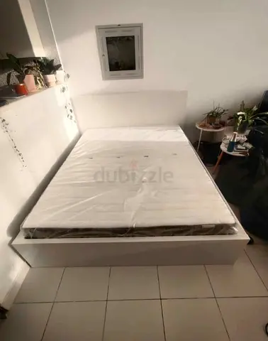 IKEA malam queen‑size bed (160 × 200 cm) with 2 storage drawers underneath and an IKEA mattress