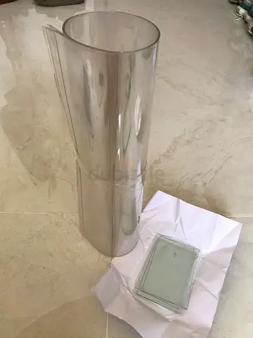 Flexible table protector, also known as soft glass. Material: Thick, transparent polyvinyl chlorid