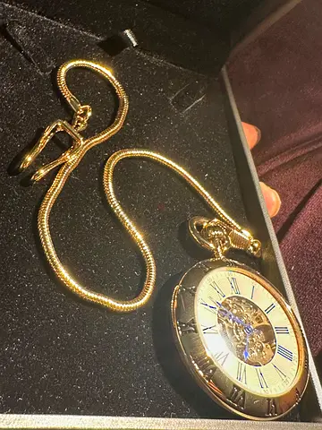 Elegant Gold Pocket Watch with Chain